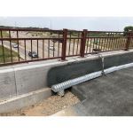 Contech Engineered Solutions - HEL-COR® Deck Drain for Railroad Bridges